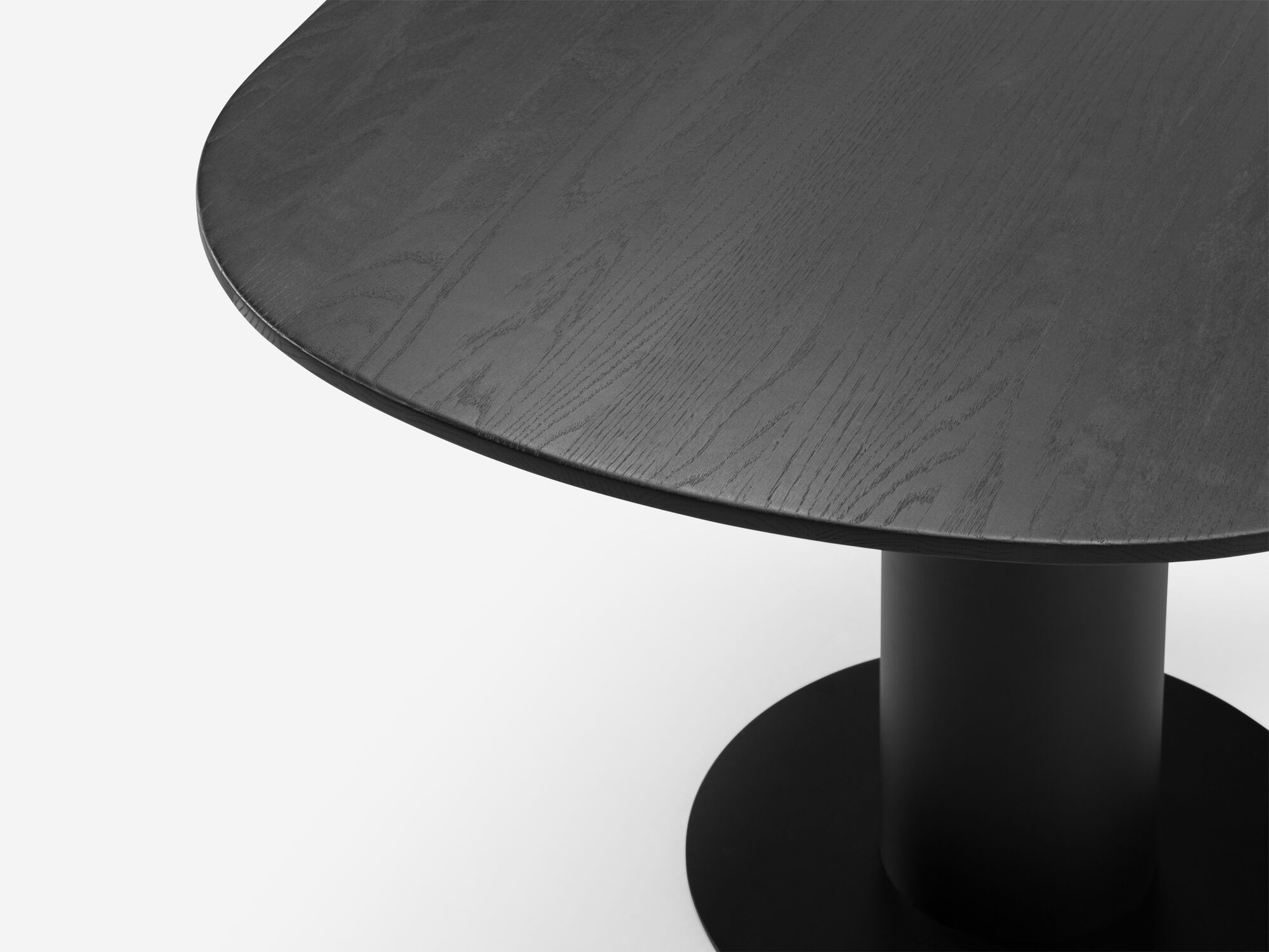 Detail angle view of extra small black dining table